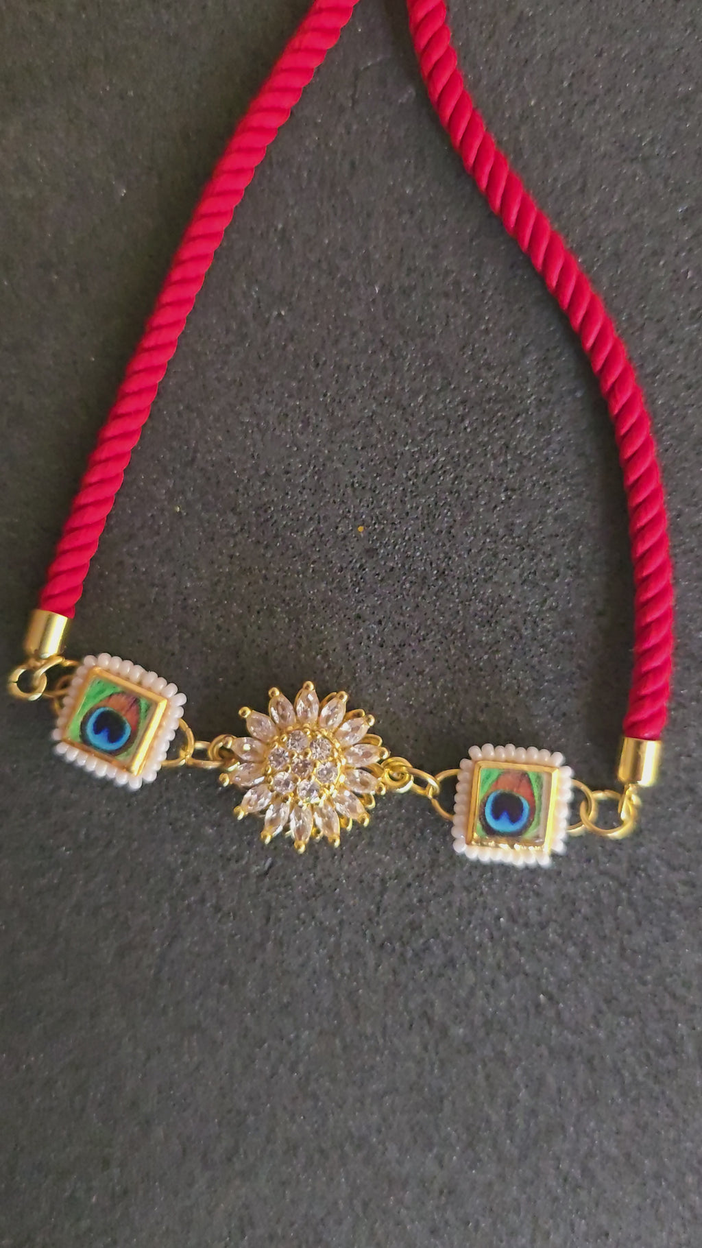 Elegant Peacock & Spining Floral Rakhi
