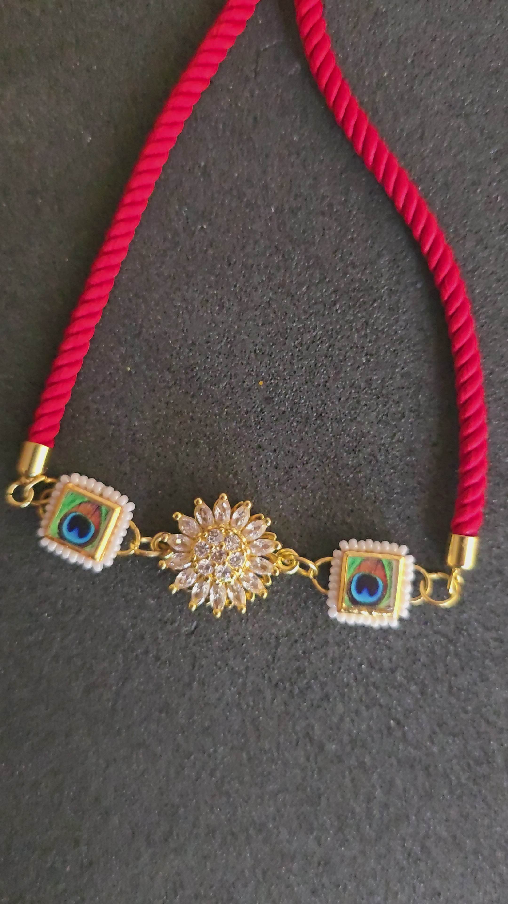 Elegant Peacock & Spining Floral Rakhi