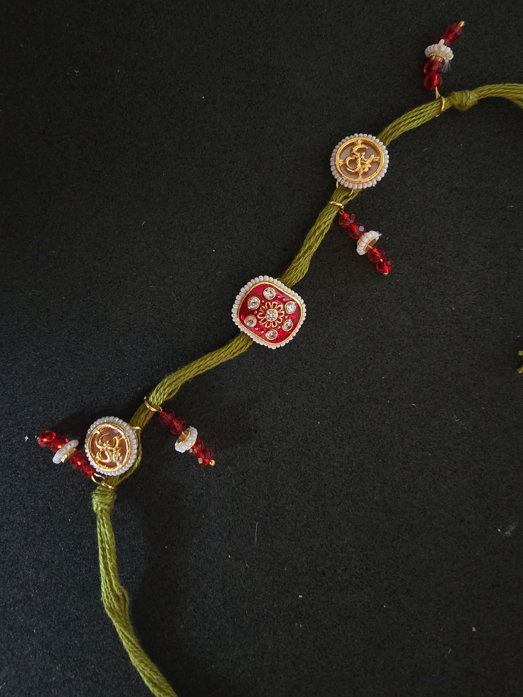 Divine Om & Kundan Traditional Rakhi