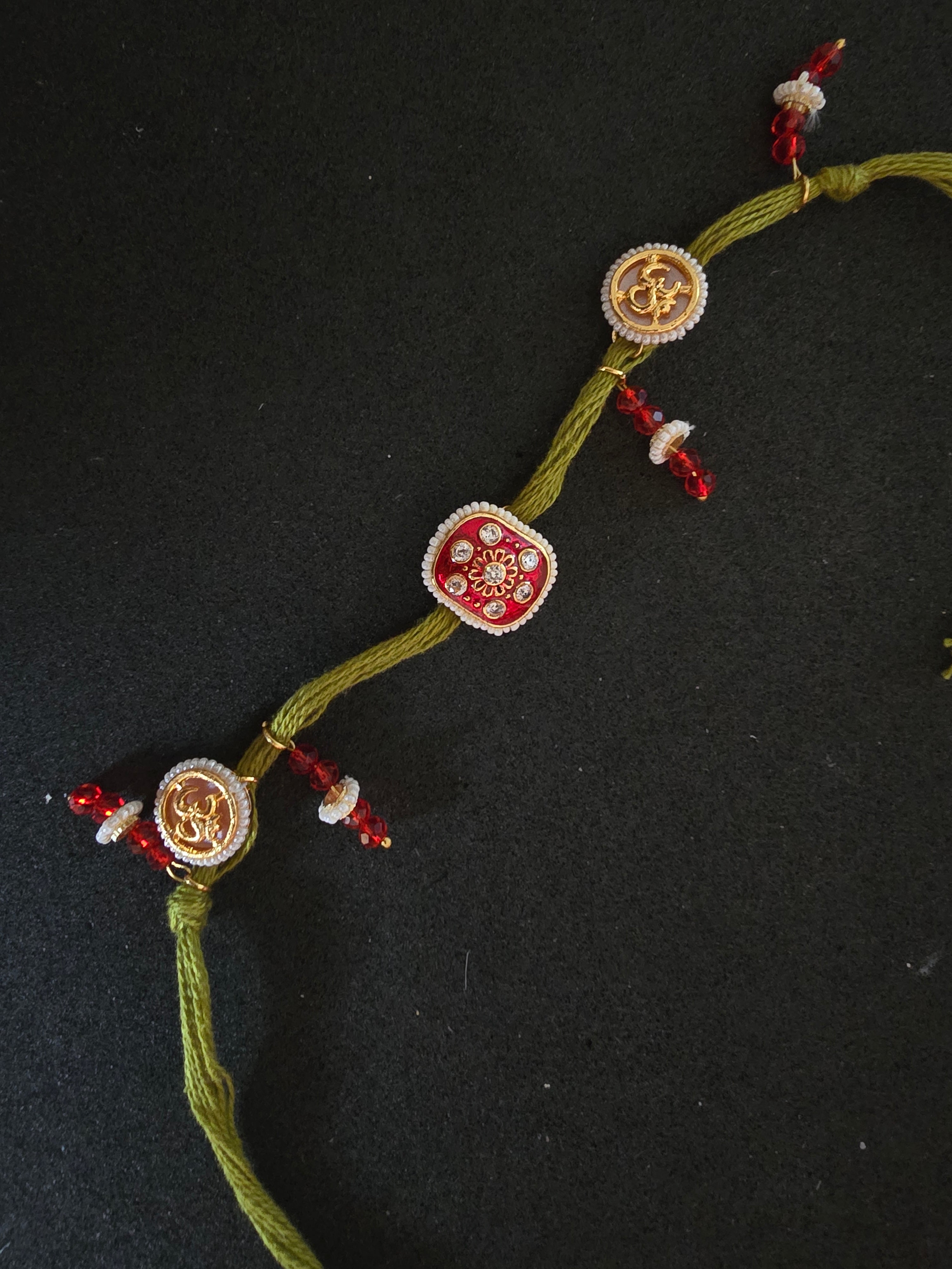 Divine Om & Kundan Traditional Rakhi