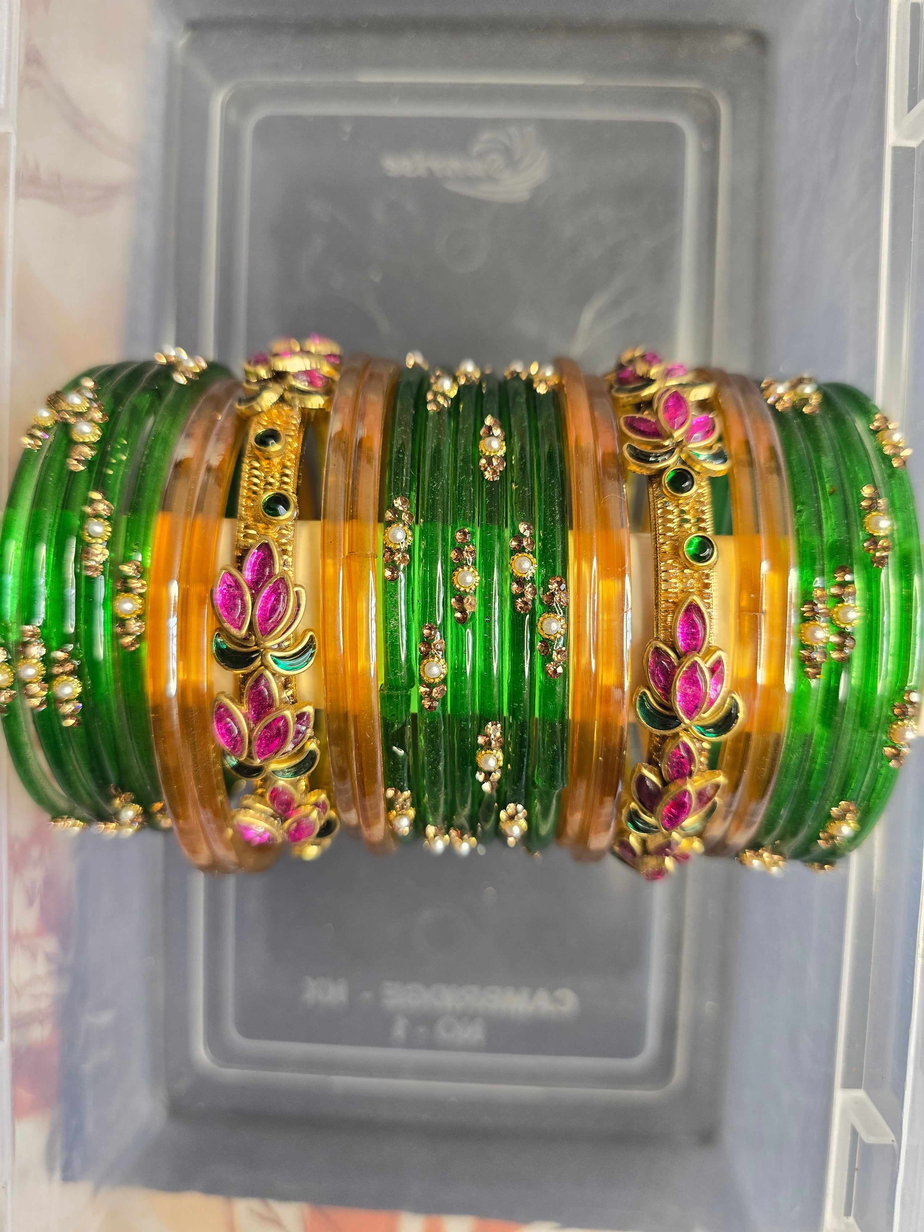 Elegant Emerald Green and Gold Bangle Set with Floral Accents