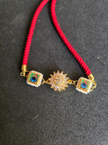 Elegant Peacock & Spining Floral Rakhi