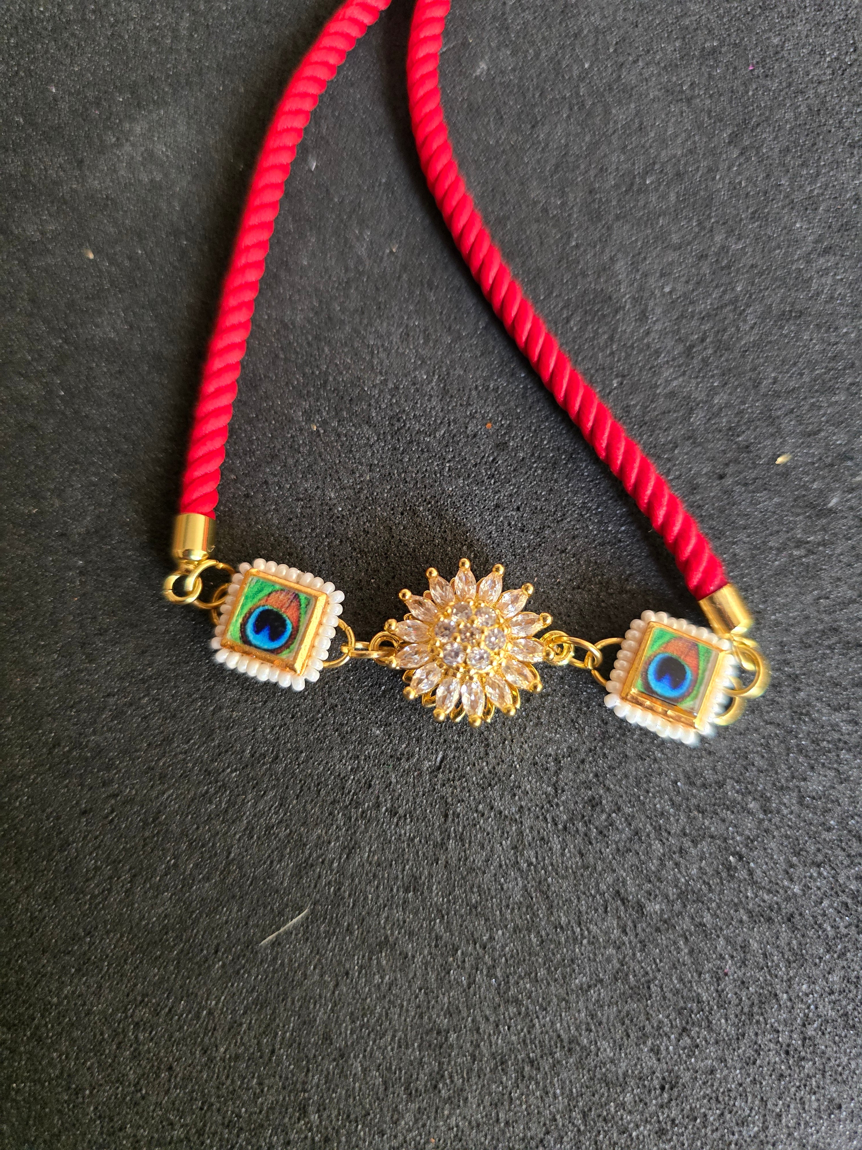Elegant Peacock & Spining Floral Rakhi