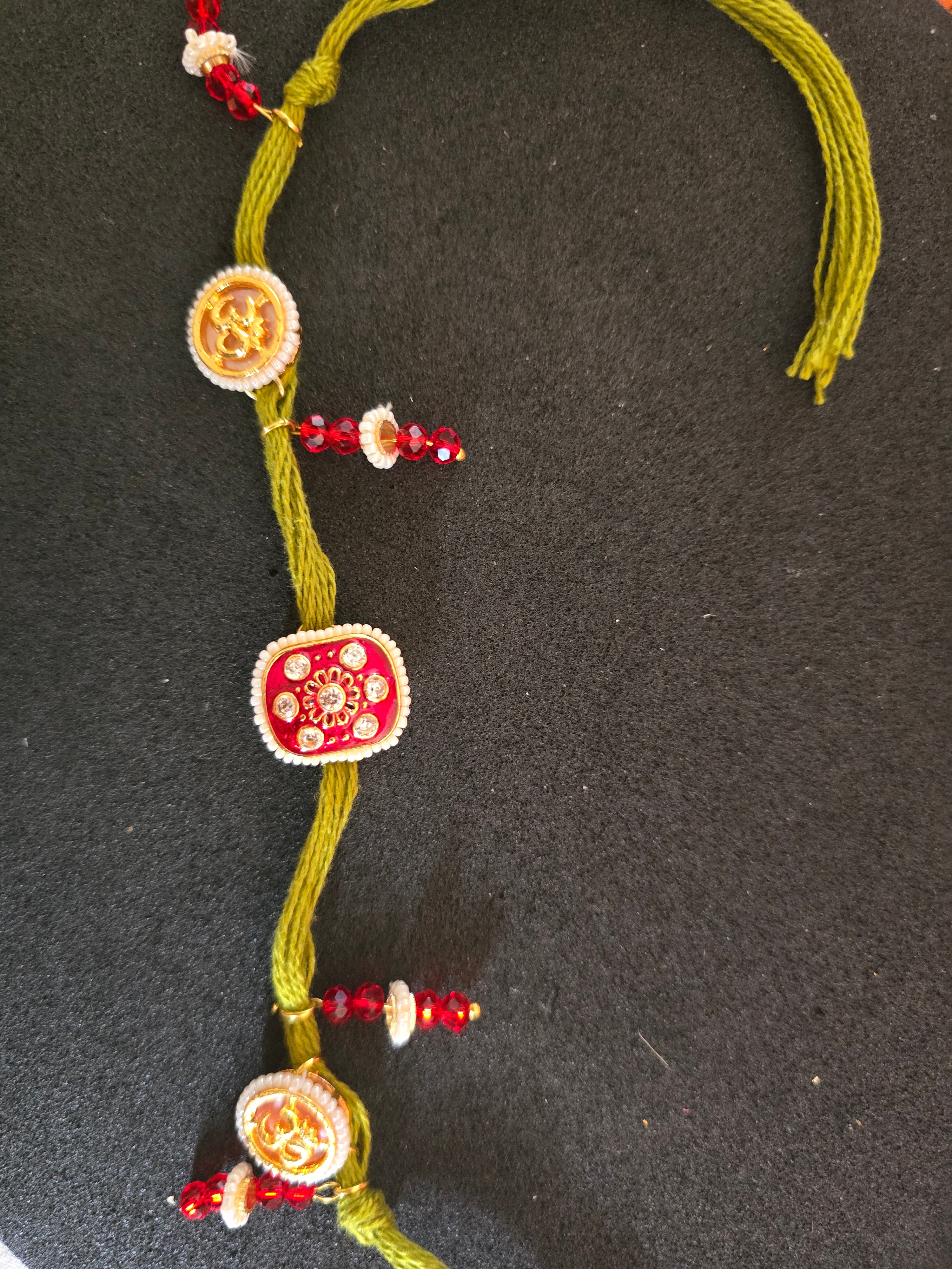 Divine Om & Kundan Traditional Rakhi